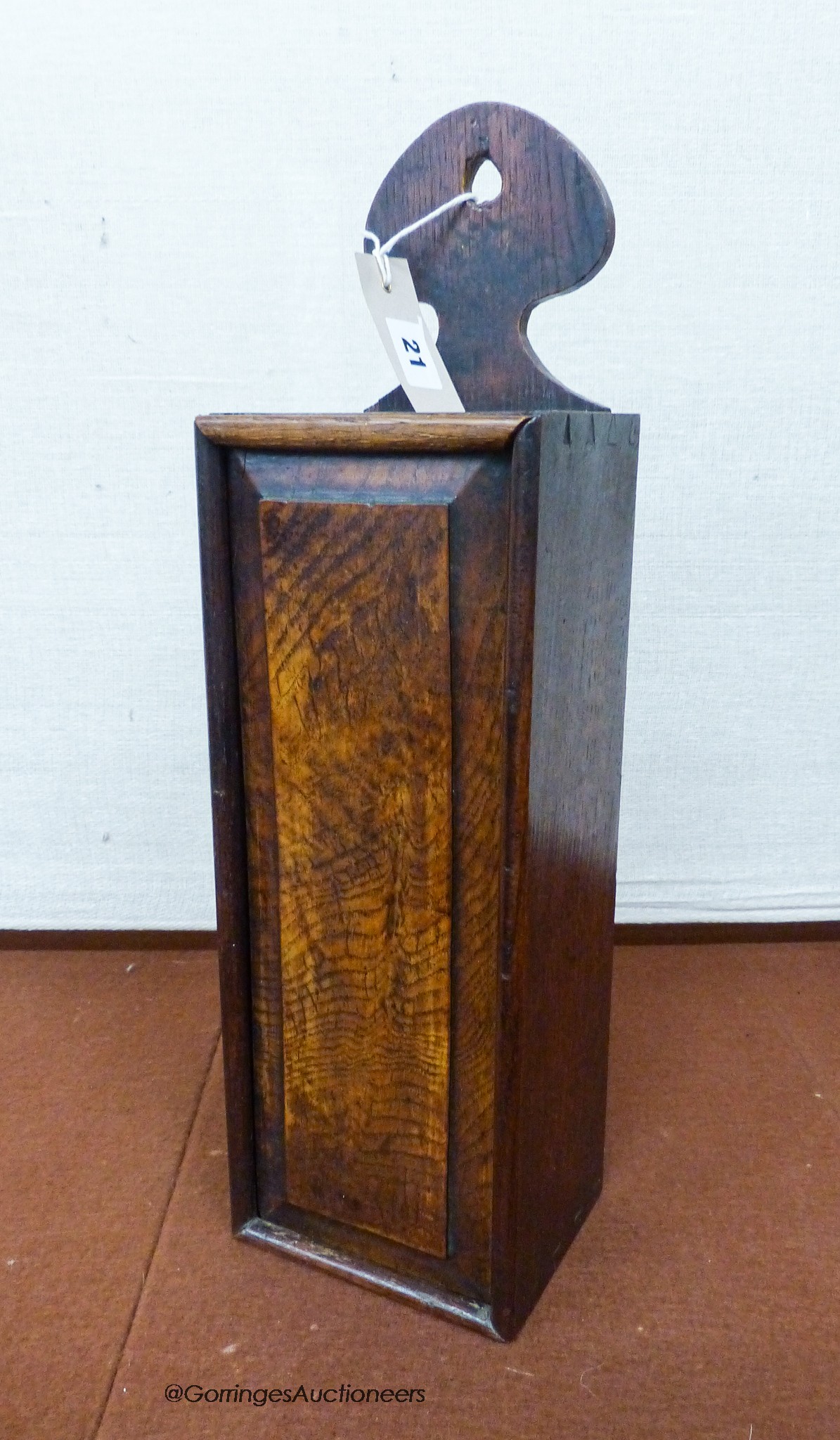 A George III oak hanging candle box, height 48cm